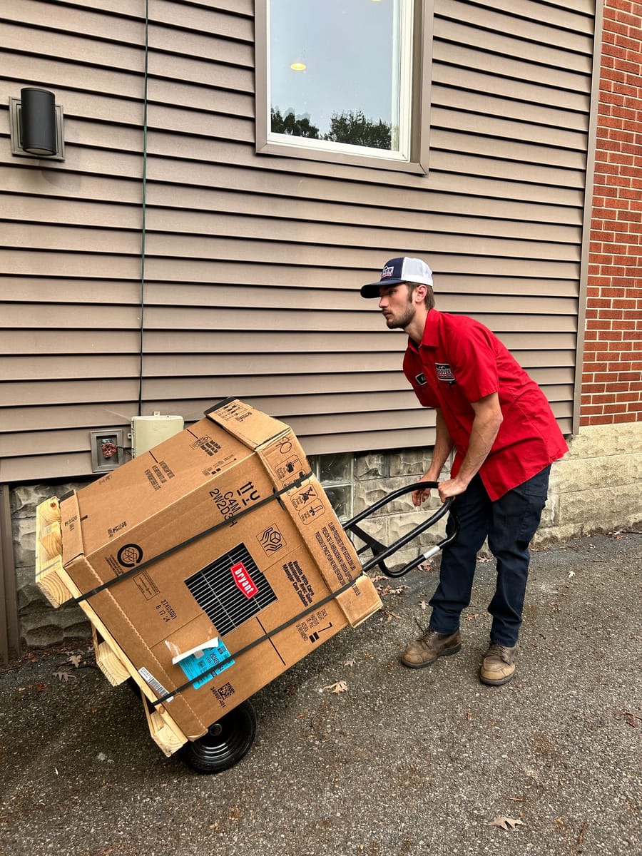 Man rolling in a new AC replacement