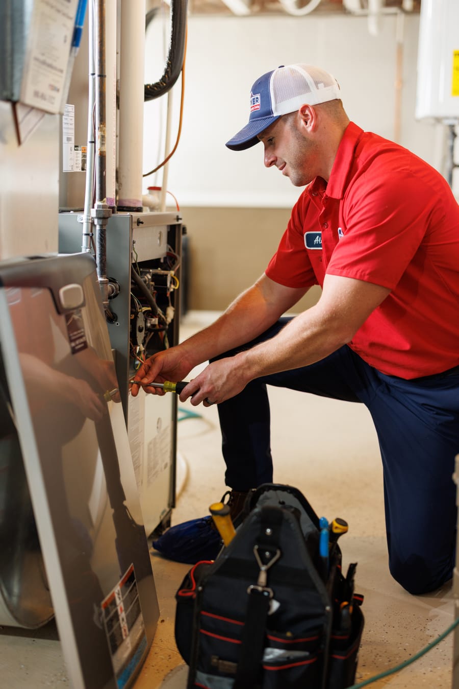 Electrician repairing electrical unit