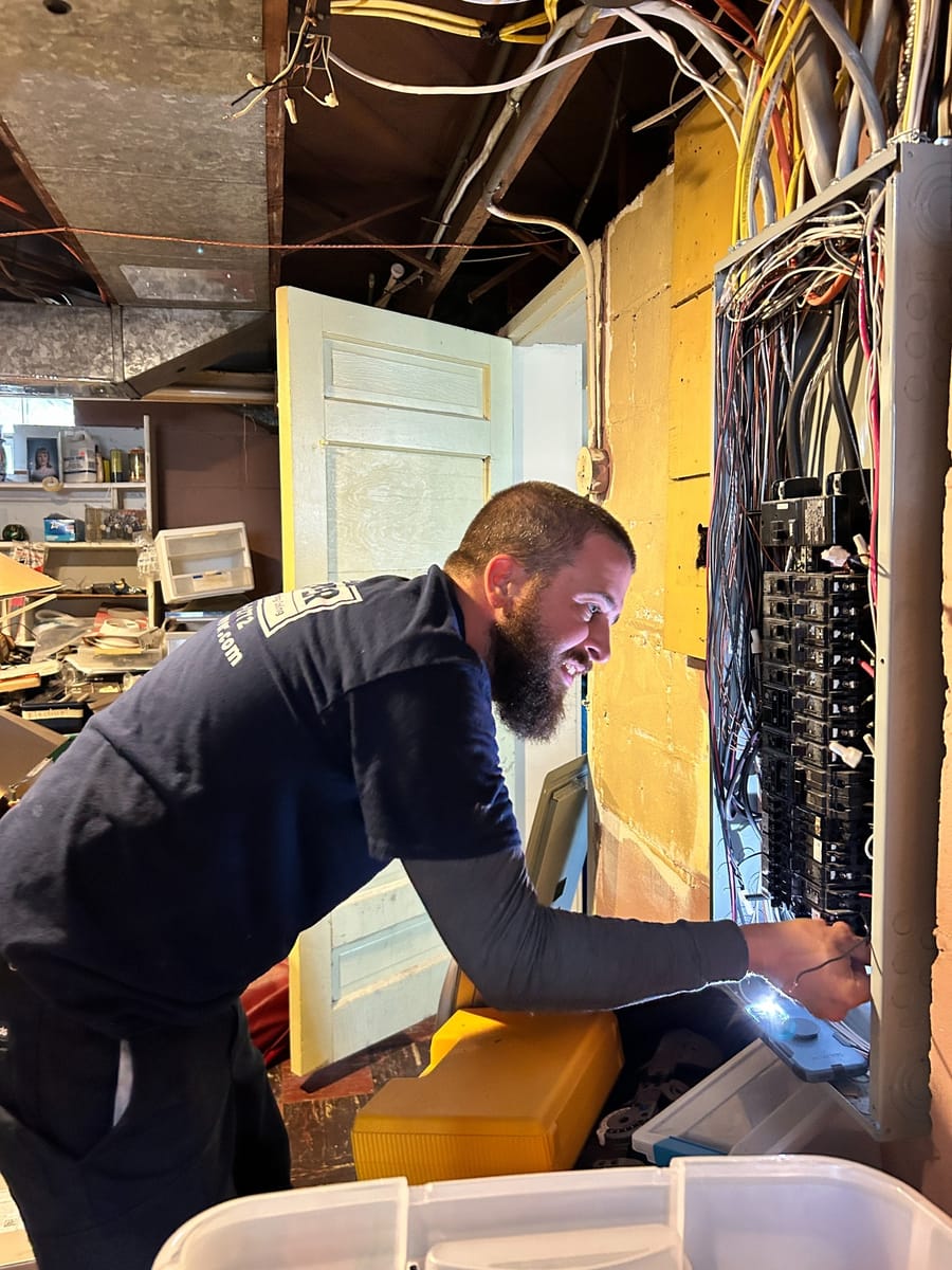 Electrician conducting electric repairs